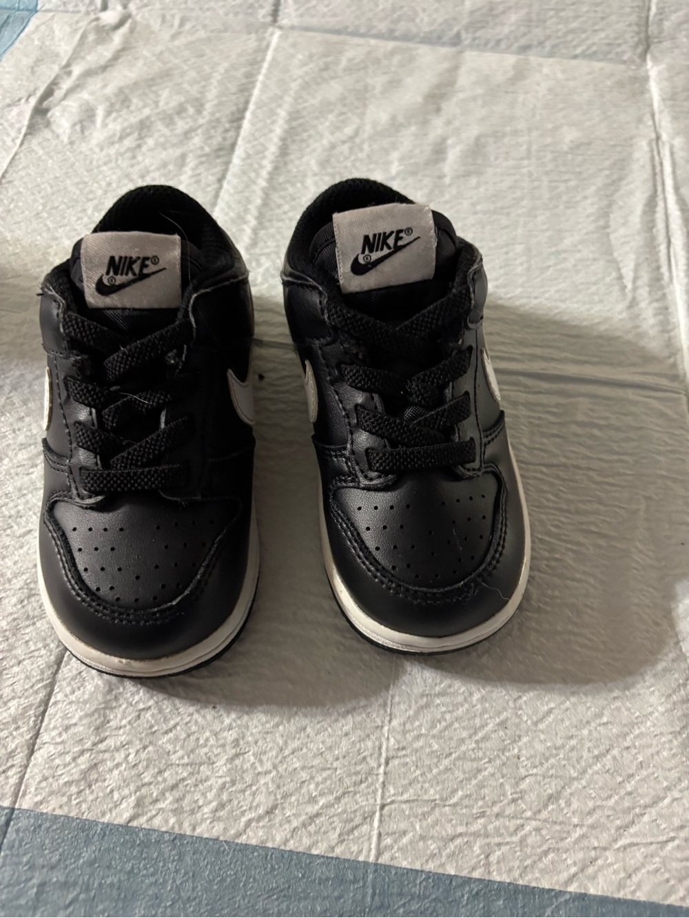 Nike Kids Black and White Low-Top Sneakers with Swoosh